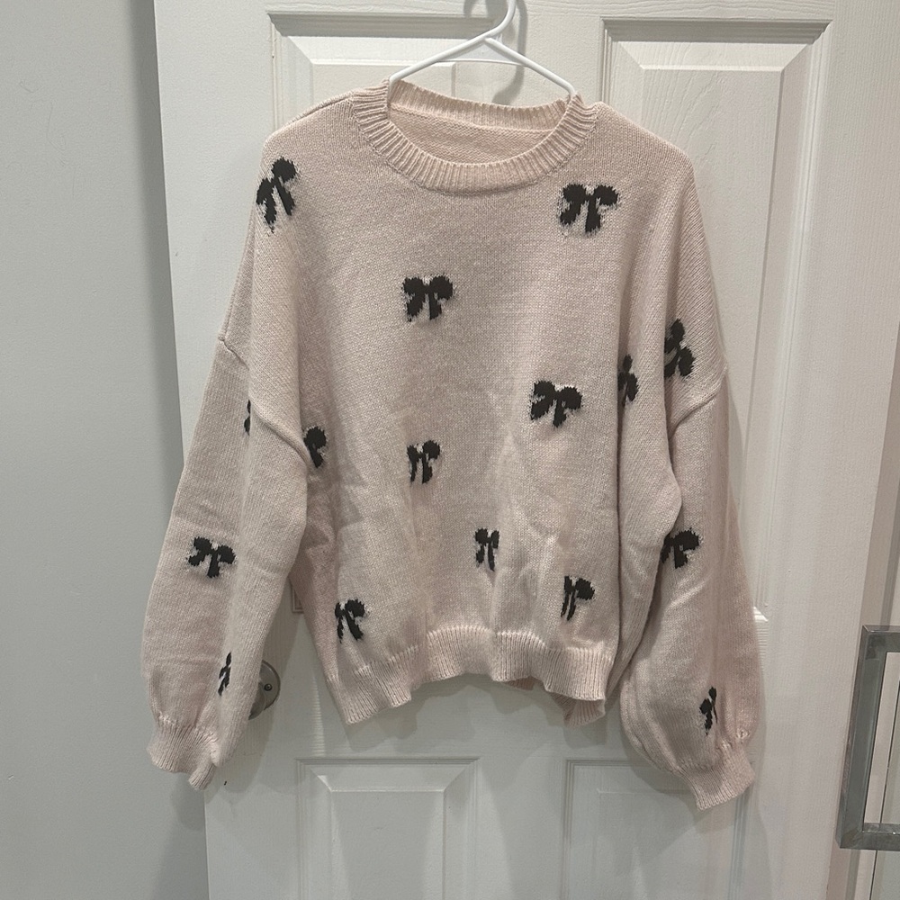 Women's tan Sweater with Black Bow Accents